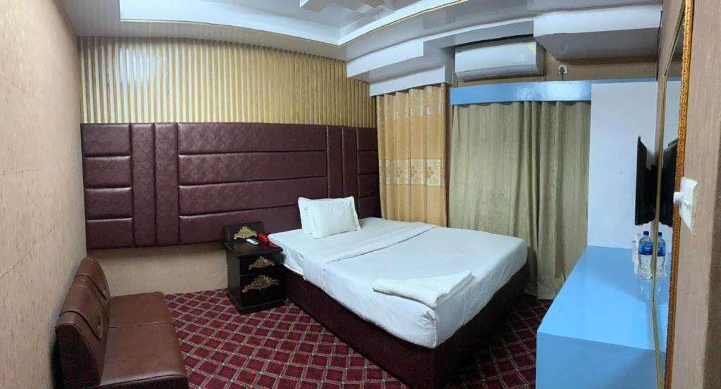 Hotel Blue Bird Daca Quarto foto