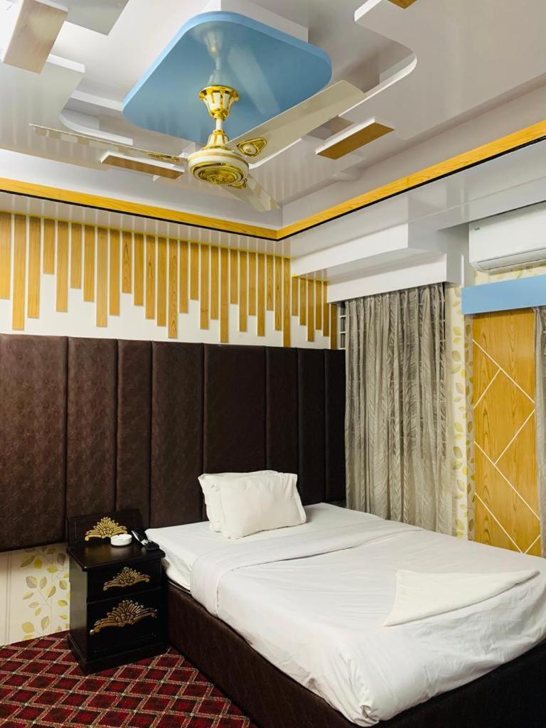 Hotel Blue Bird Daca Quarto foto