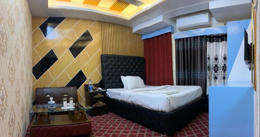 Hotel Blue Bird Daca Quarto foto