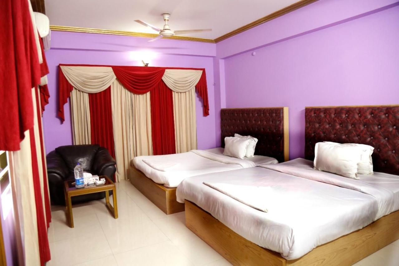 Hotel Blue Bird Daca Quarto foto