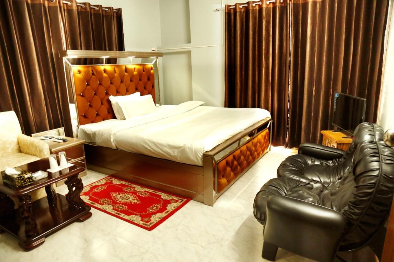 Hotel Blue Bird Daca Quarto foto