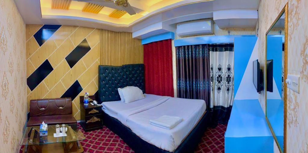 Hotel Blue Bird Daca Quarto foto