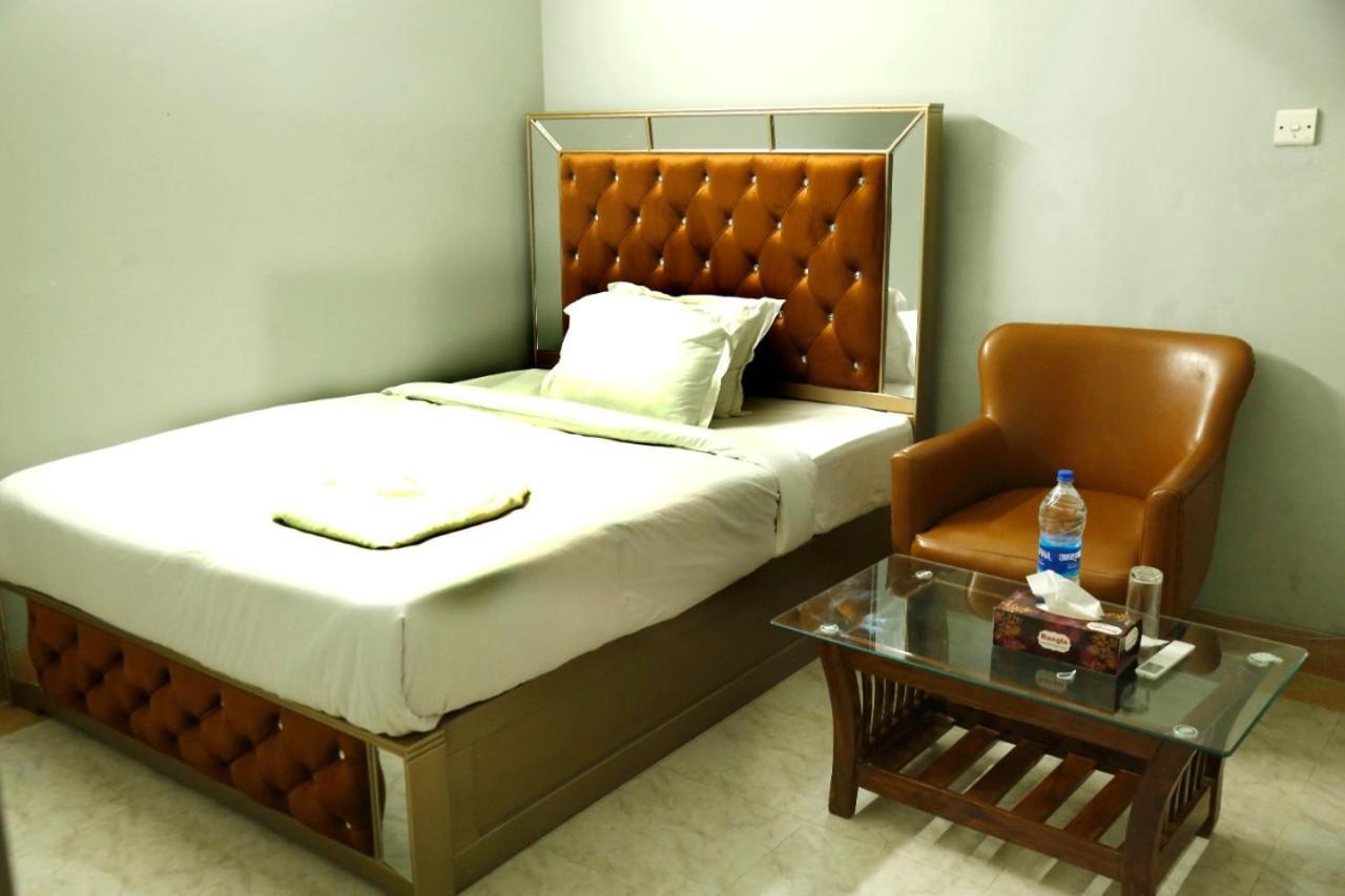 Hotel Blue Bird Daca Quarto foto