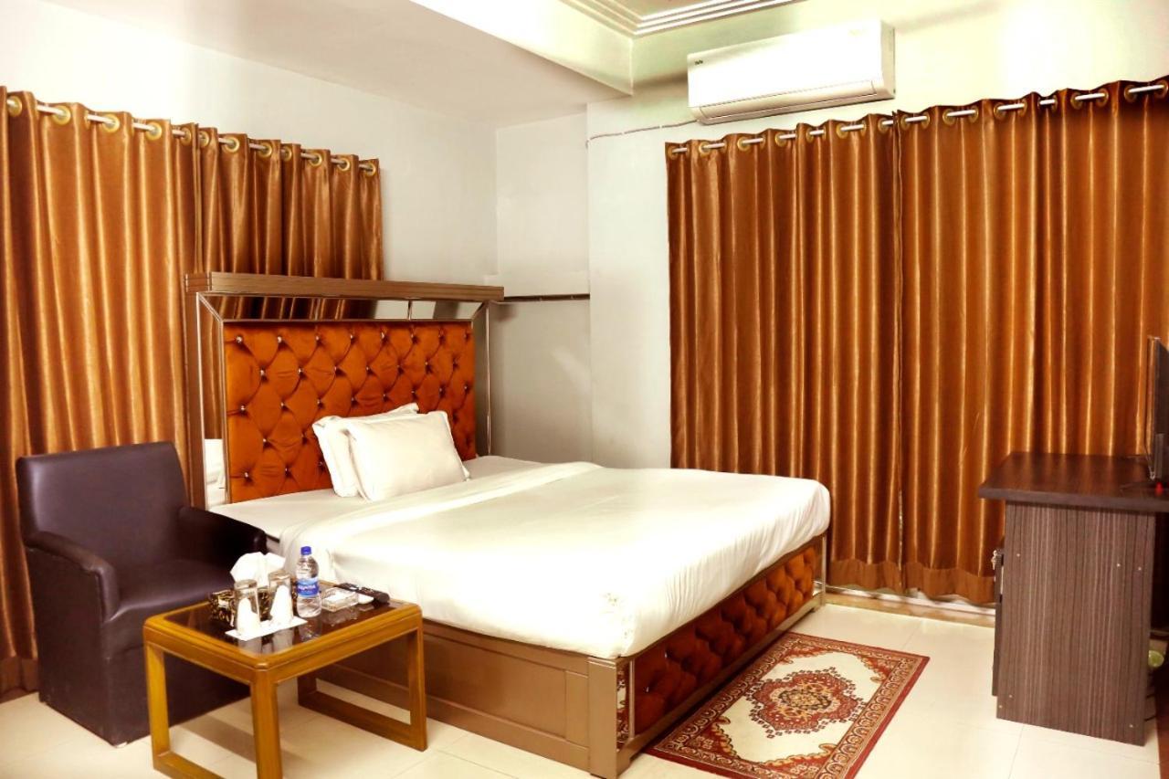 Hotel Blue Bird Daca Quarto foto