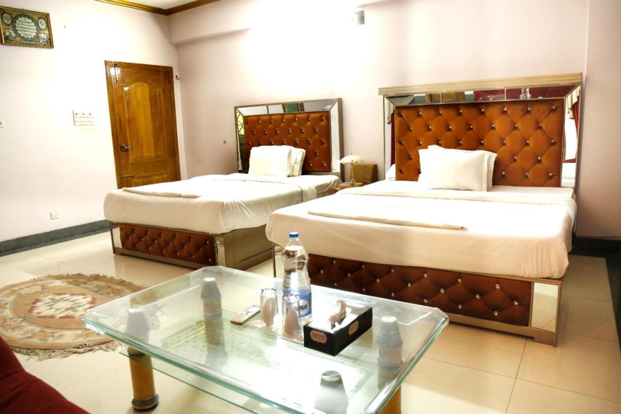 Hotel Blue Bird Daca Quarto foto