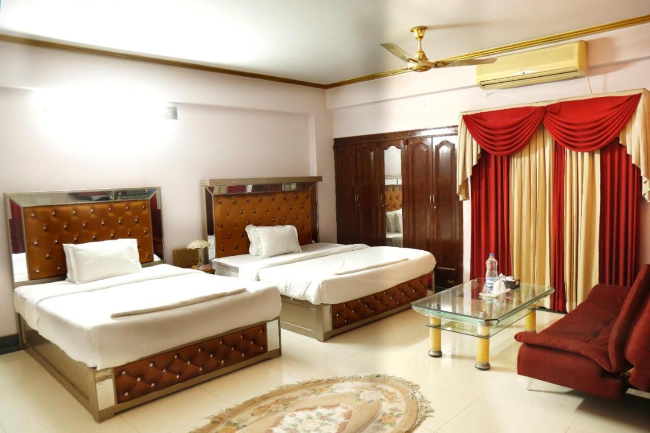 Hotel Blue Bird Daca Quarto foto