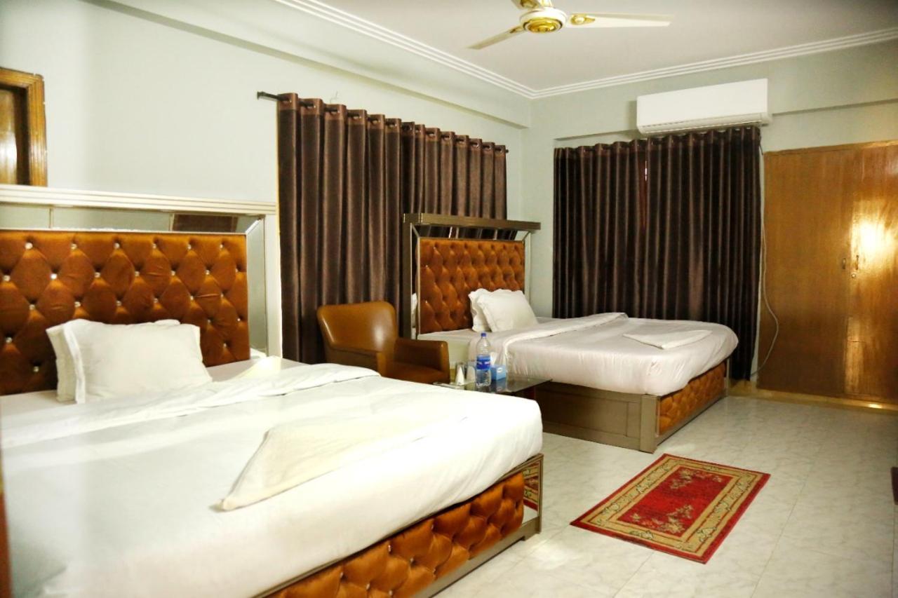 Hotel Blue Bird Daca Quarto foto